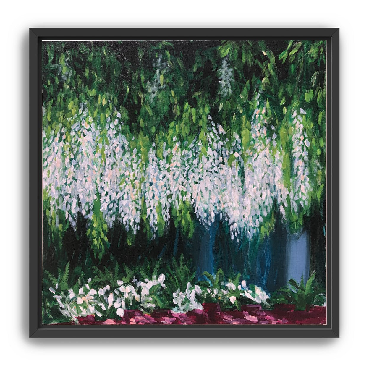 Pale blossoms in green shade