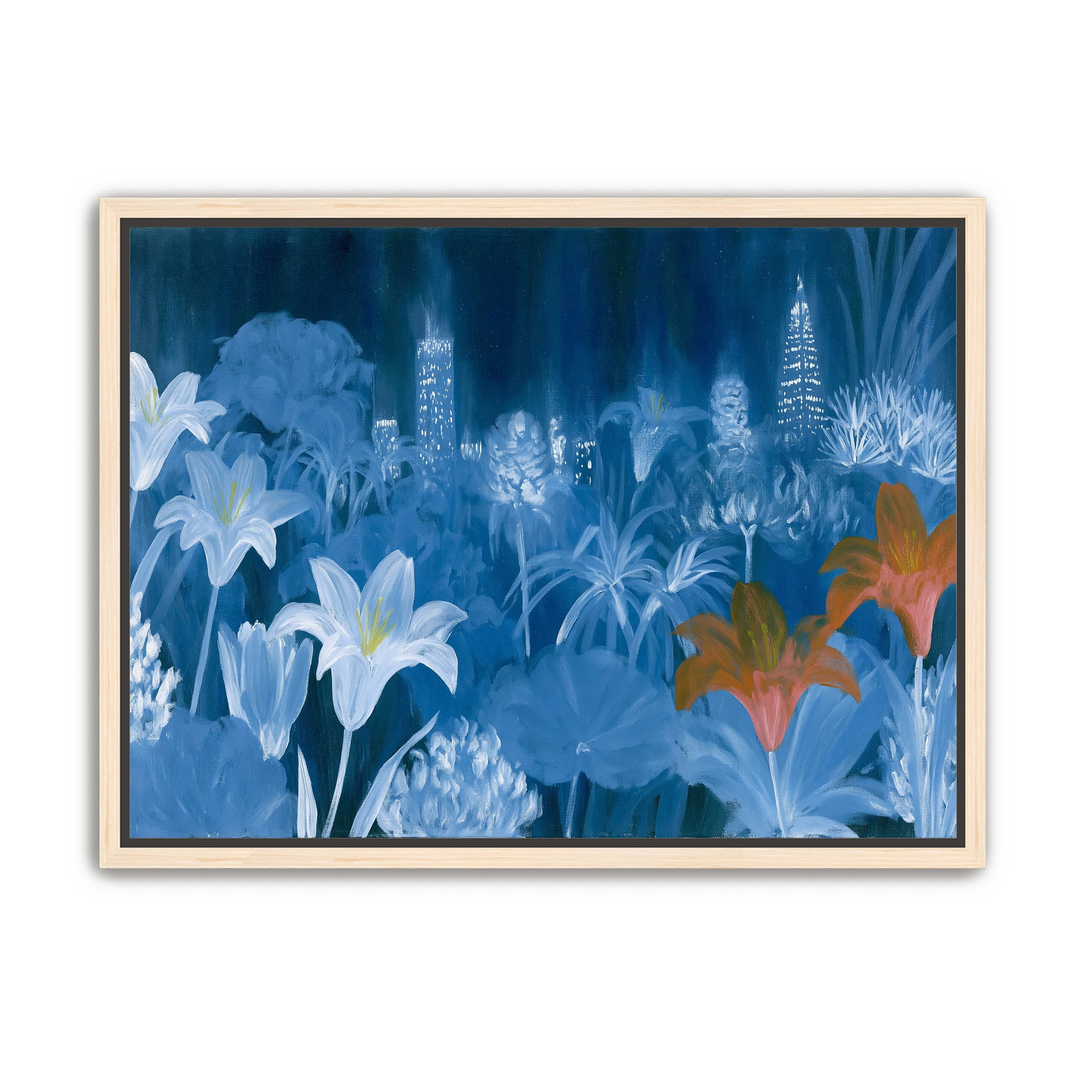 City lights behind lilies