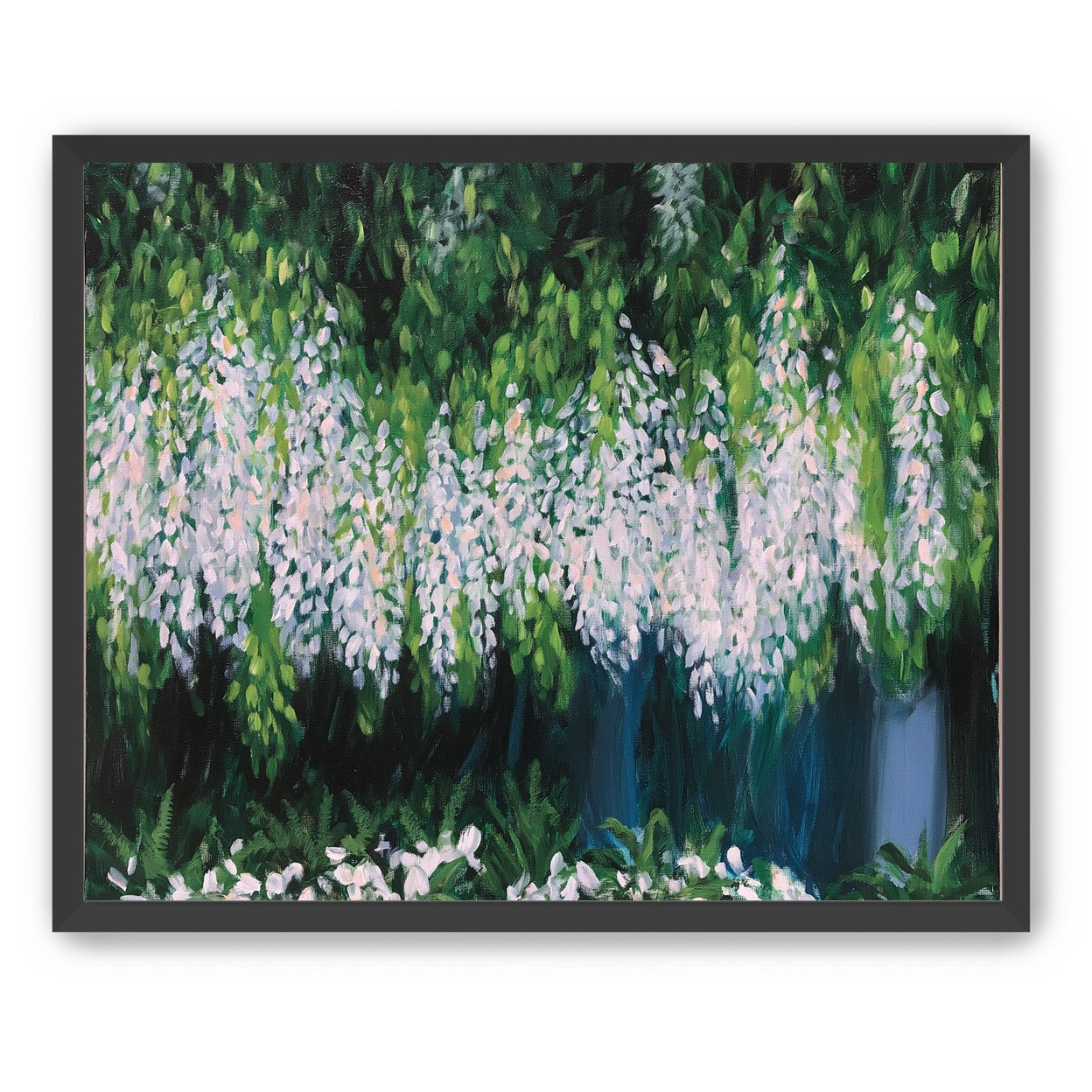 Pale blossoms in green shade