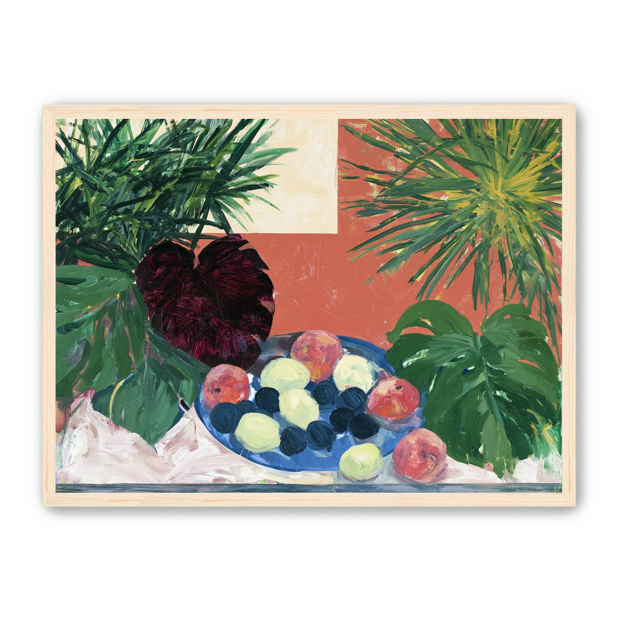 Coral wall behind green leaves