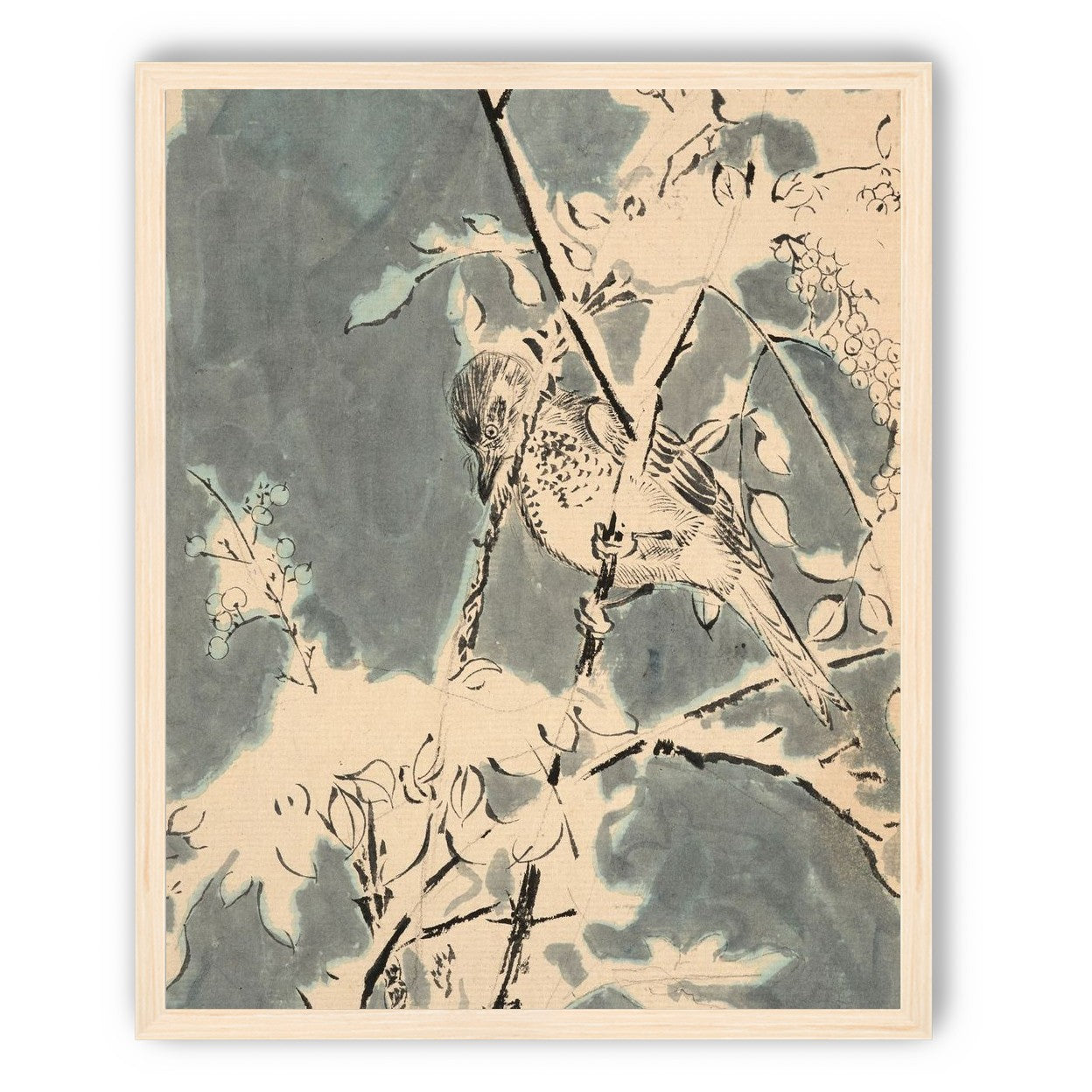 Quiet bird in berry branches