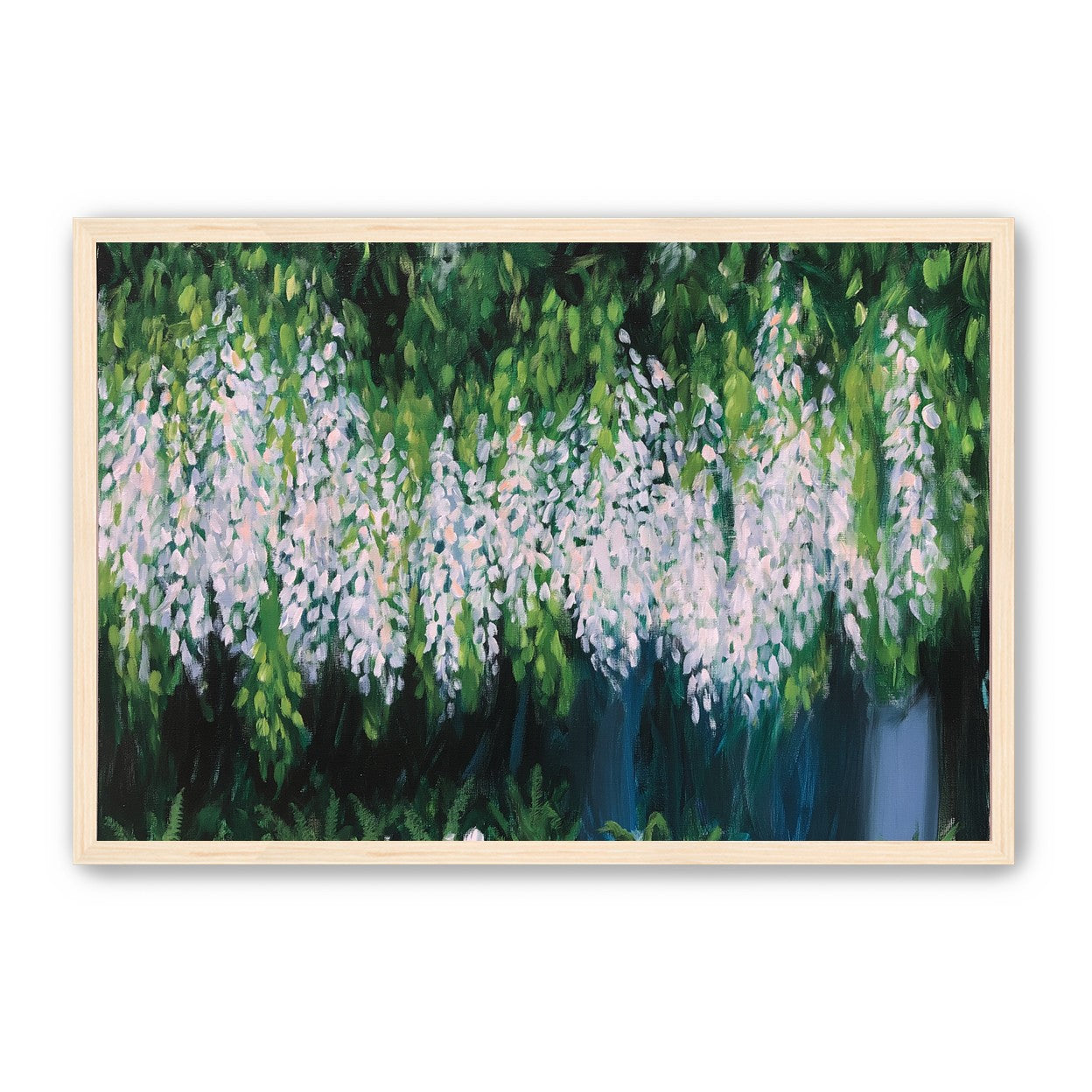 Pale blossoms in green shade