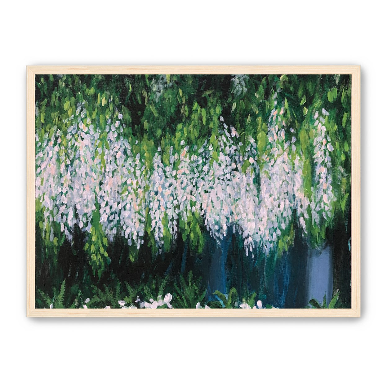 Pale blossoms in green shade
