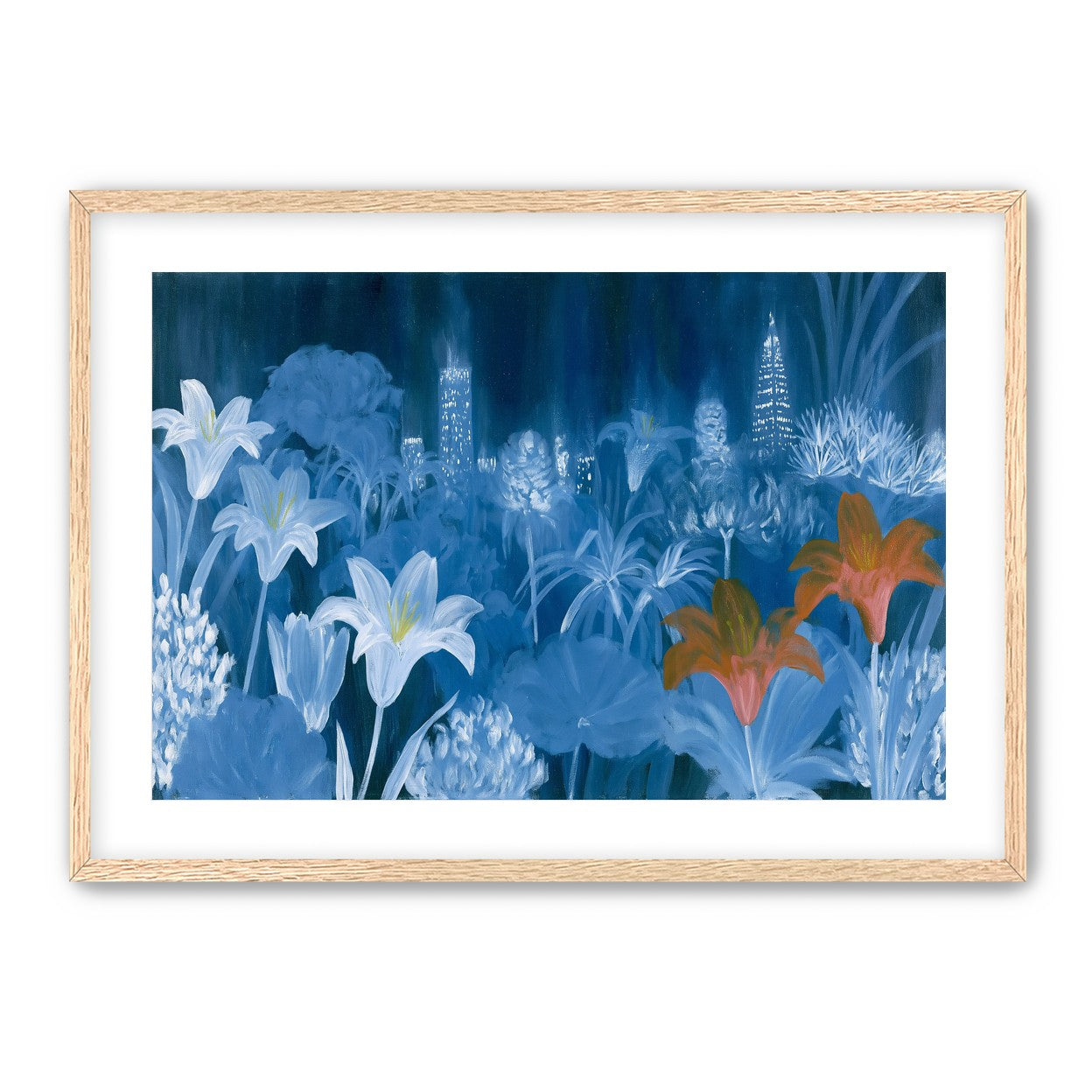 City lights behind lilies