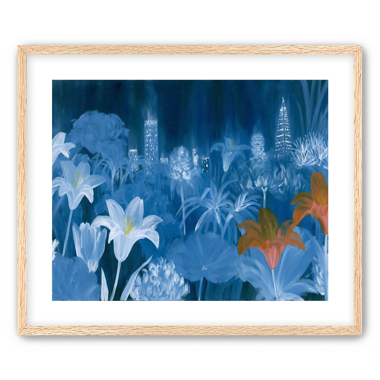 City lights behind lilies