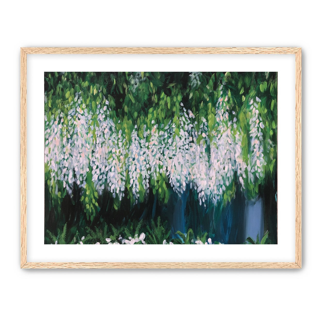Pale blossoms in green shade