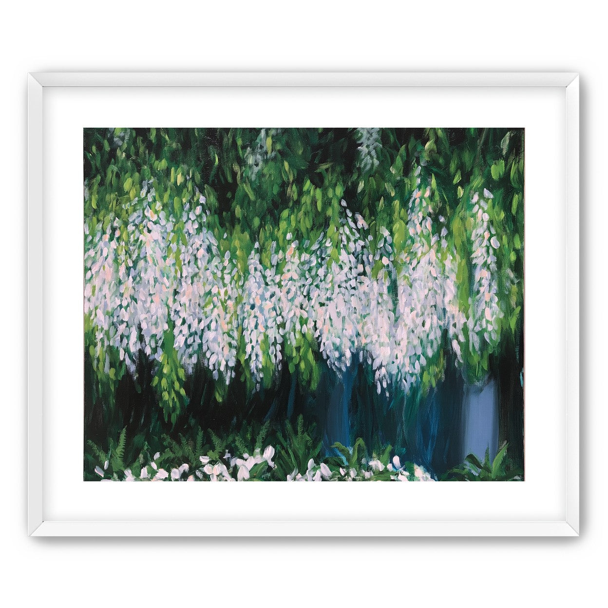 Pale blossoms in green shade