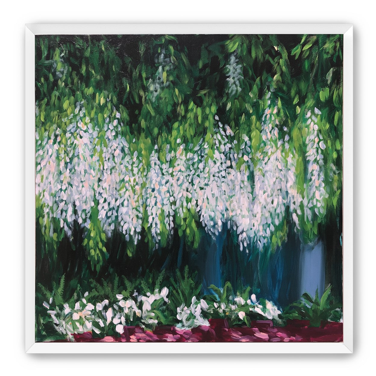 Pale blossoms in green shade