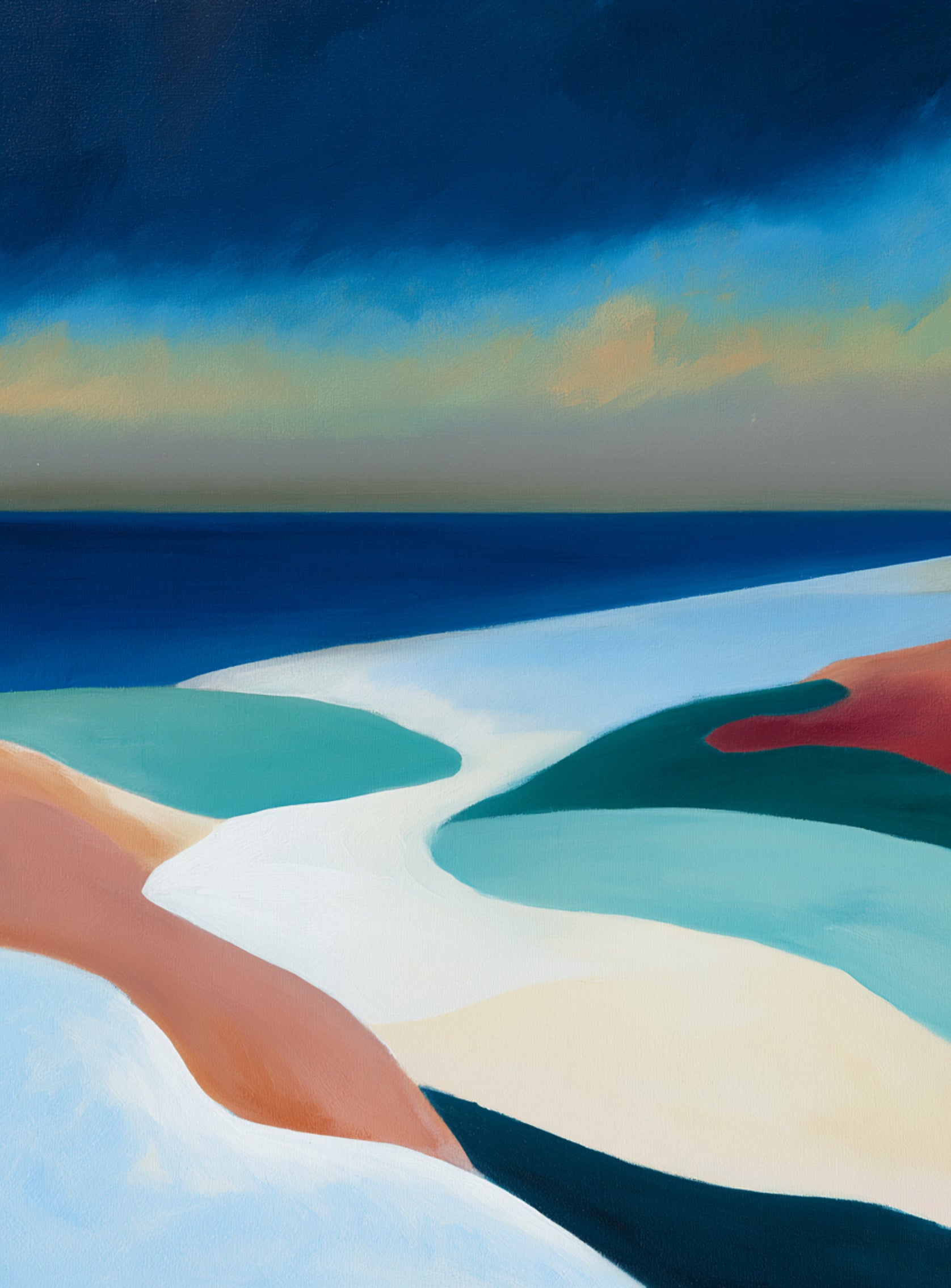 Sandbars under a heavy blue sky