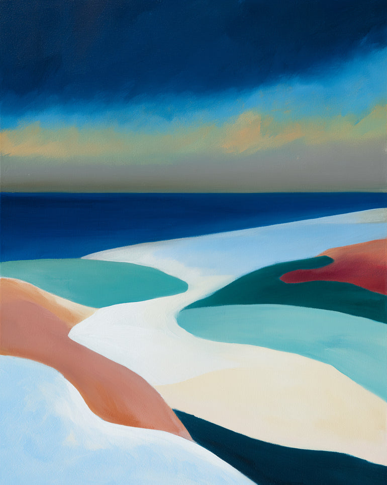 Sandbars under a heavy blue sky