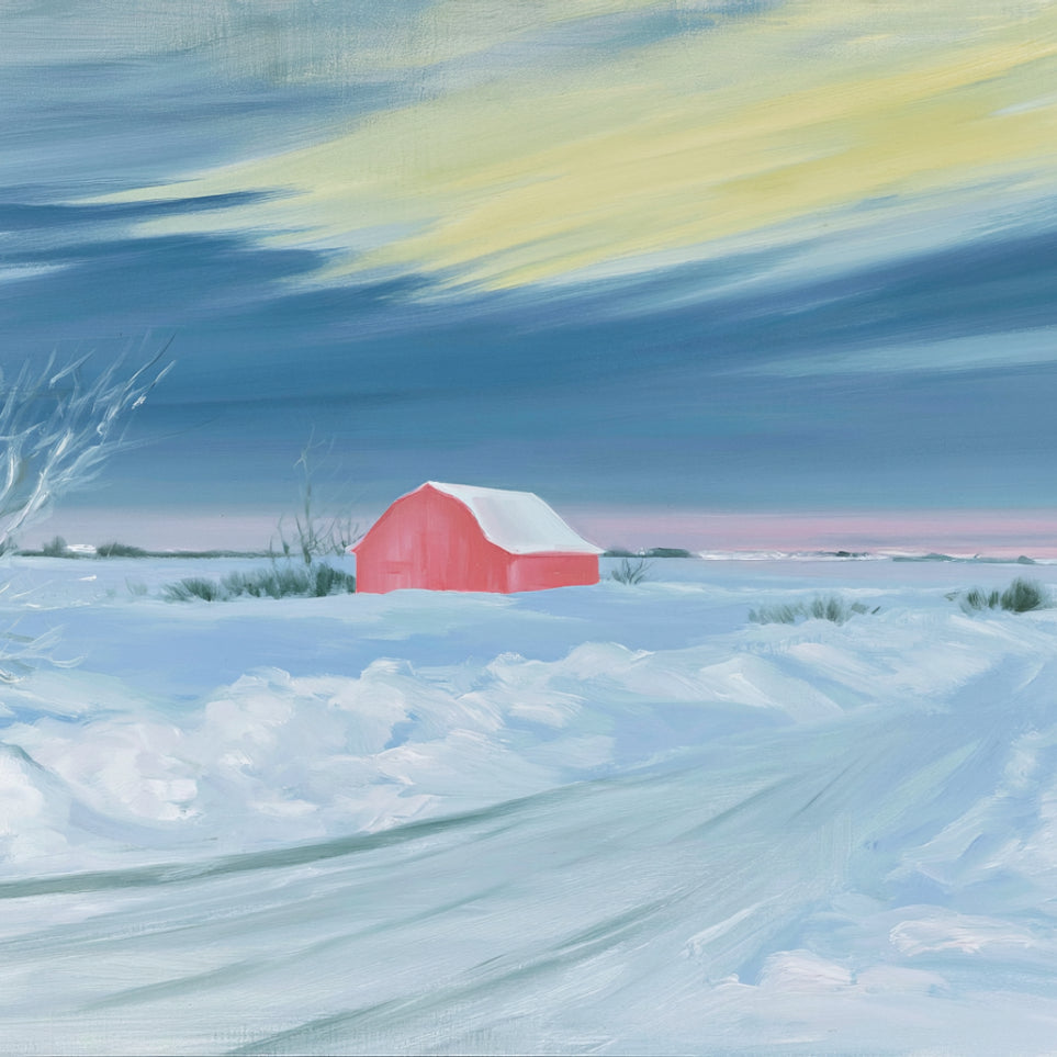 Red barn beneath winter sky