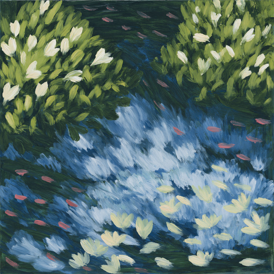 Water lilies over passing fish
