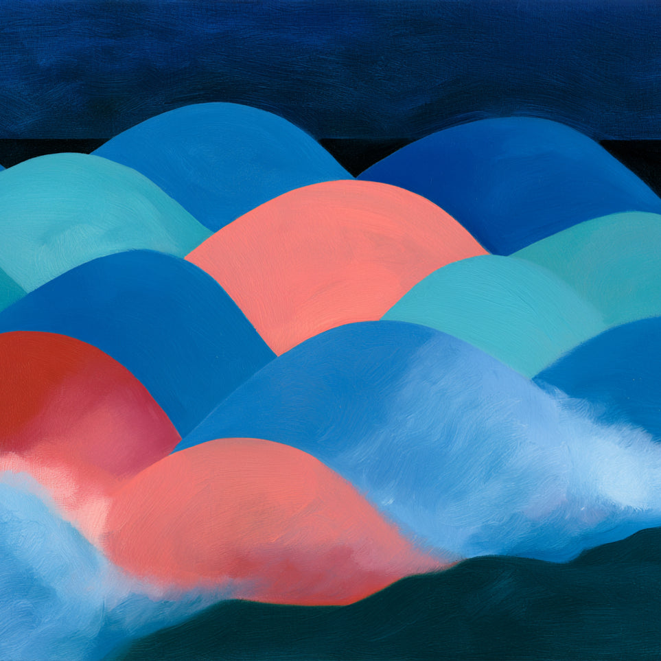 Pink moon among blue hills