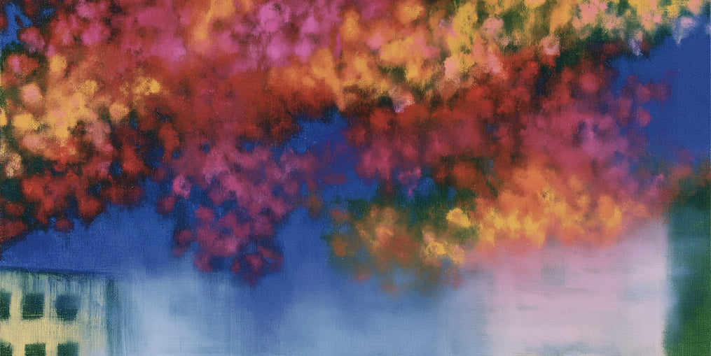 Trees above blurred windows