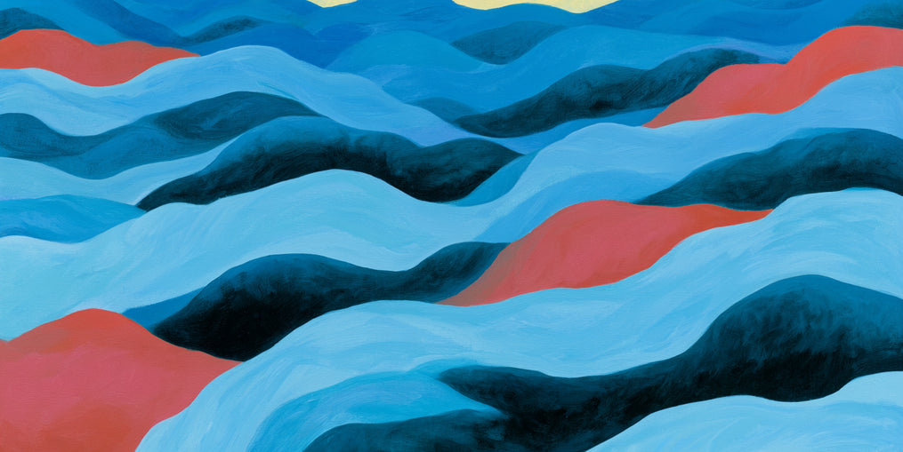 Blue hills under pale sky