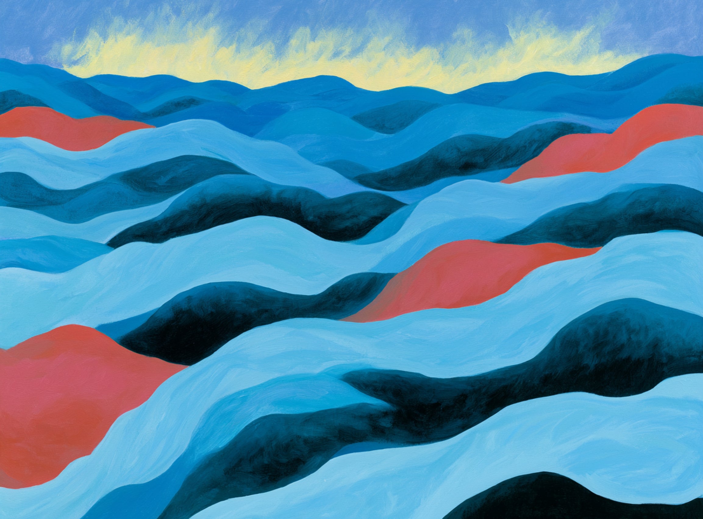 Blue hills under pale sky