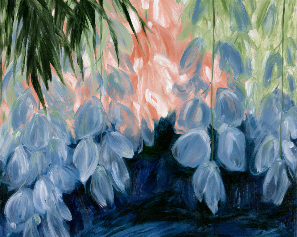Blue flowers under green leaves