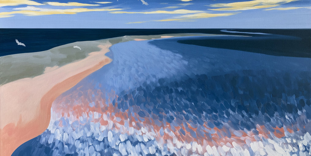 Pale sand in blue water
