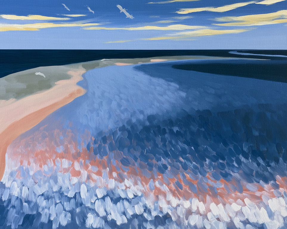 Pale sand in blue water