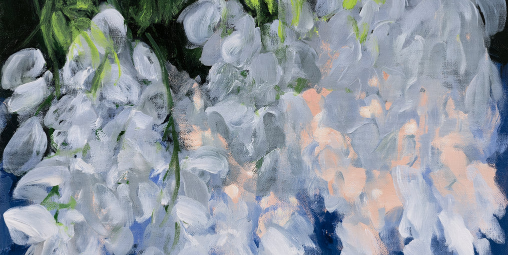 White blooms in blue shade