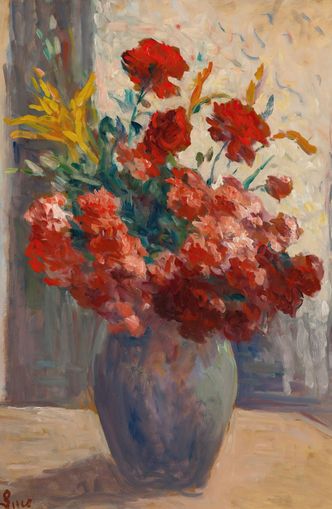 Flowers within a tall vase