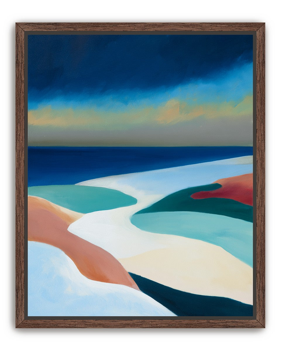 Sandbars under a heavy blue sky