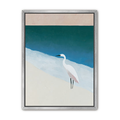 White egret at the shoreline