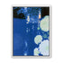 White blooms on blue canal