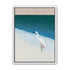 White egret at the shoreline