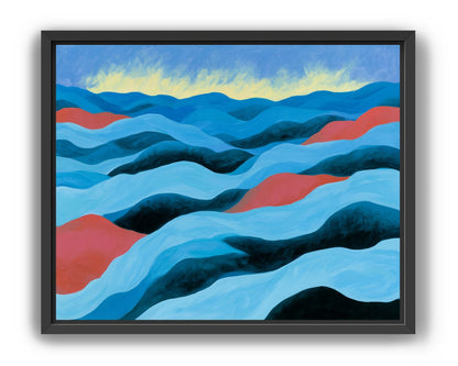 Blue hills under pale sky