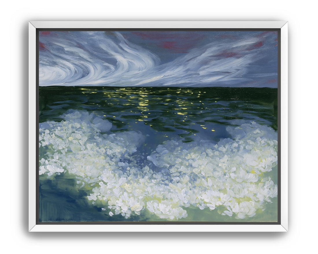 Foam and starlight at sea