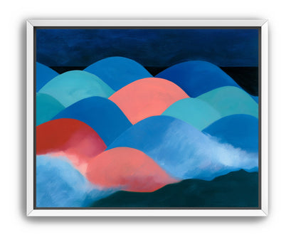 Pink moon among blue hills