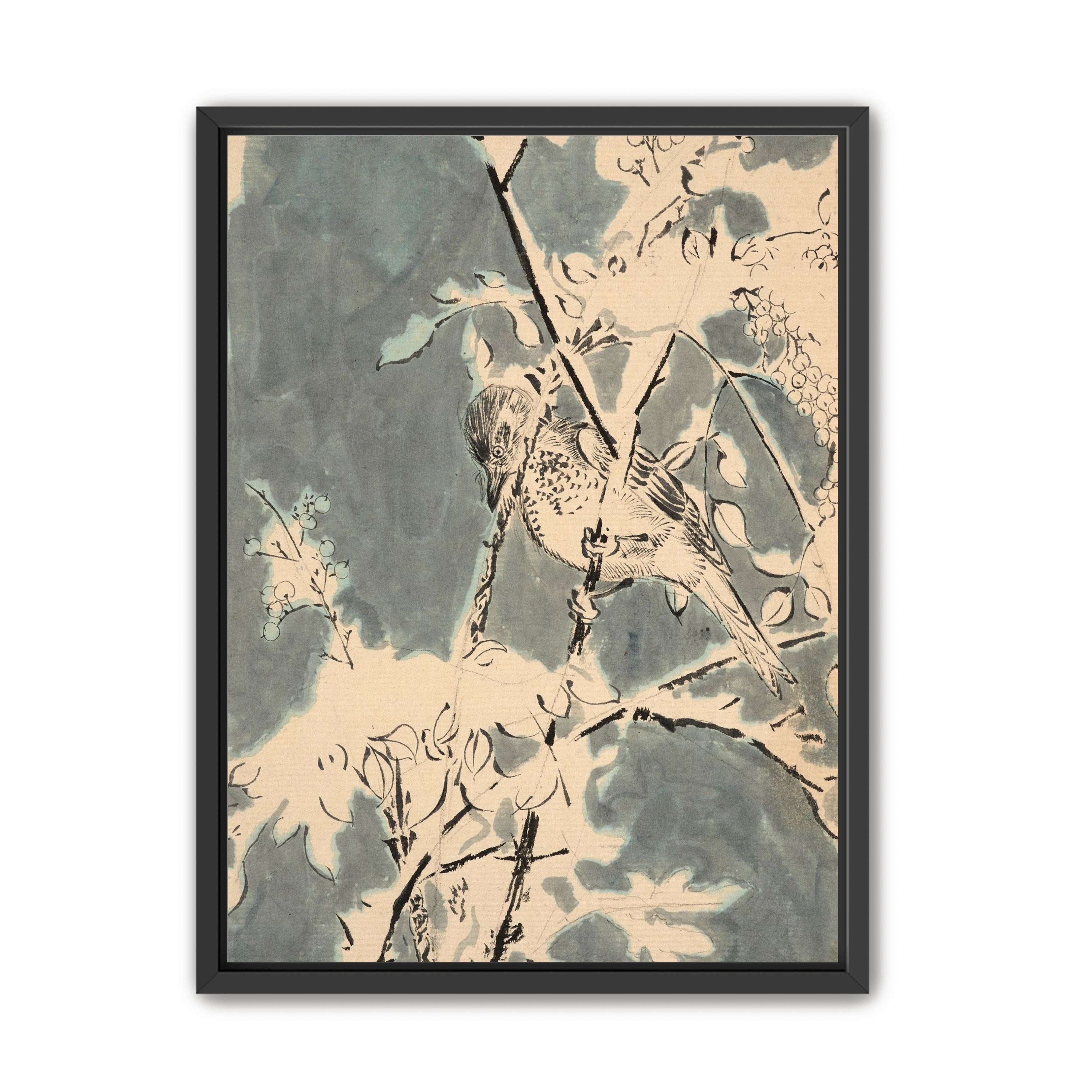 Quiet bird in berry branches