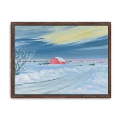 Red barn beneath winter sky