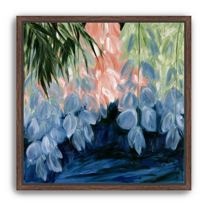 Blue flowers under green leaves