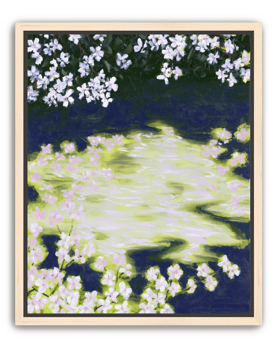 Petals crossing the bright water