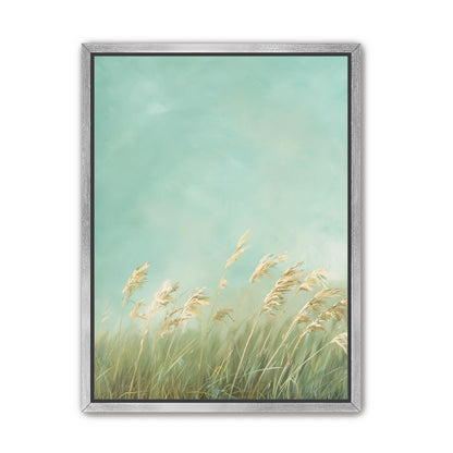 Turquoise sky over pale grass