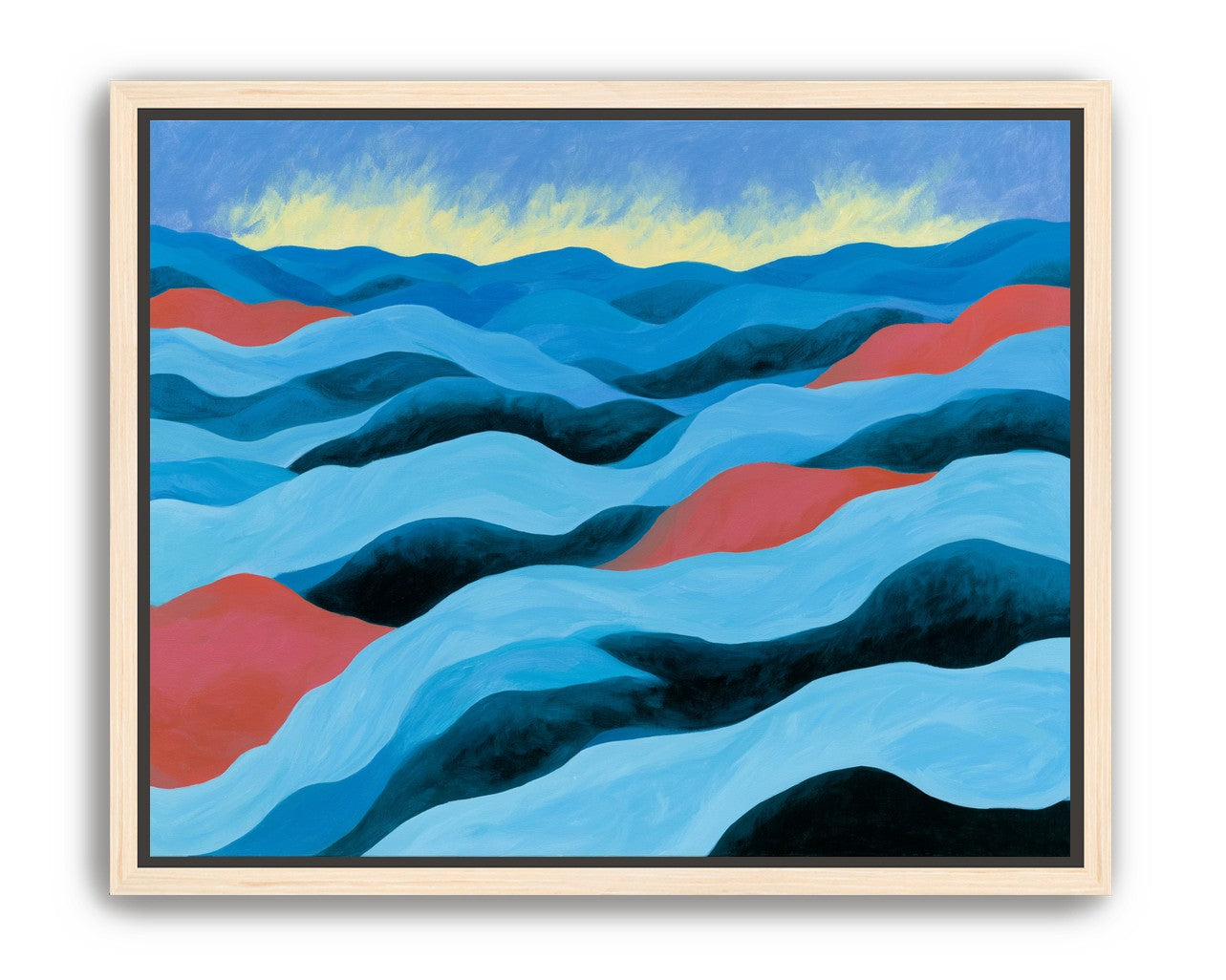 Blue hills under pale sky