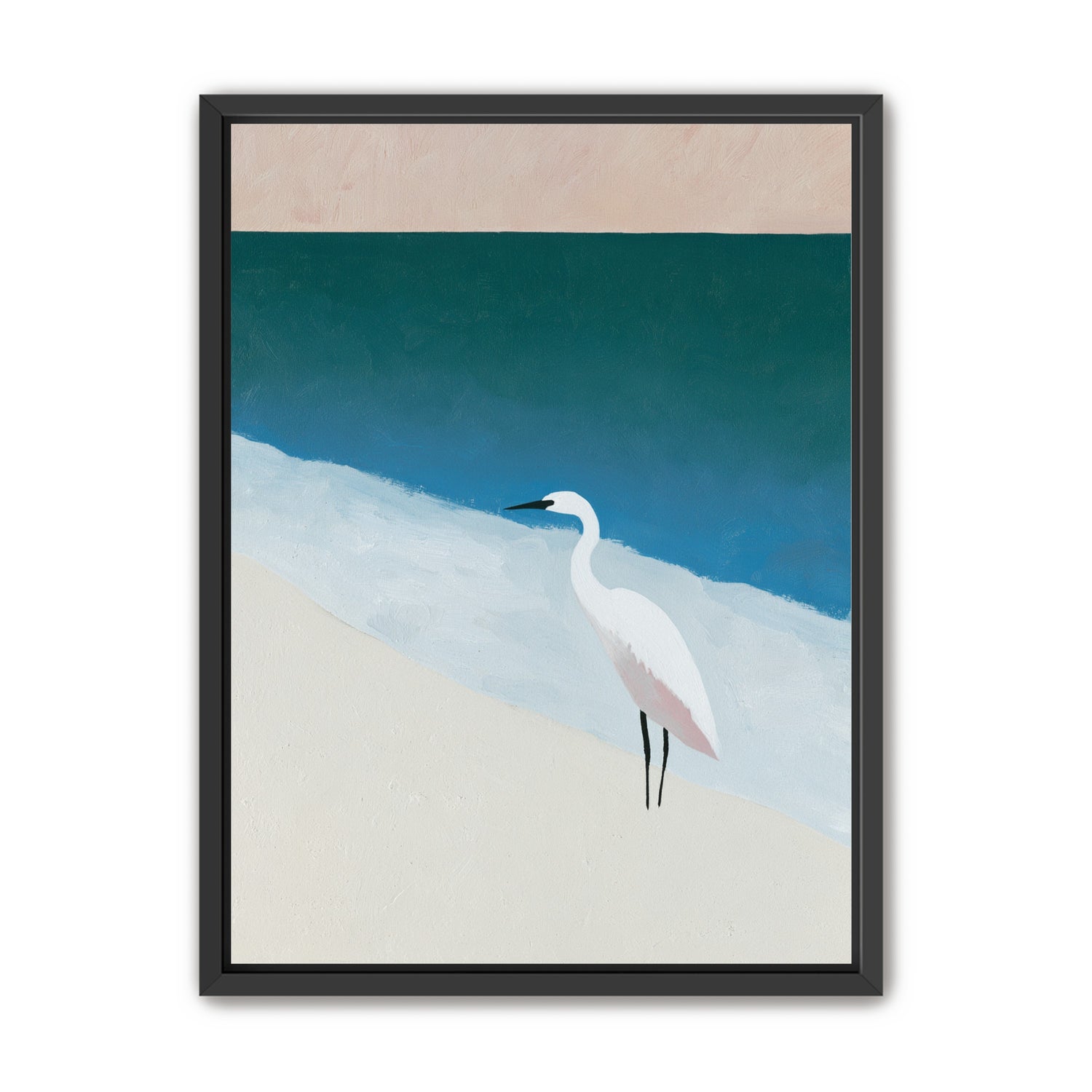 White egret at the shoreline