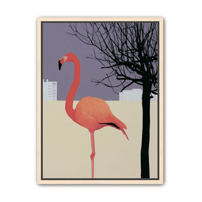 A flamingo beside the bare tree