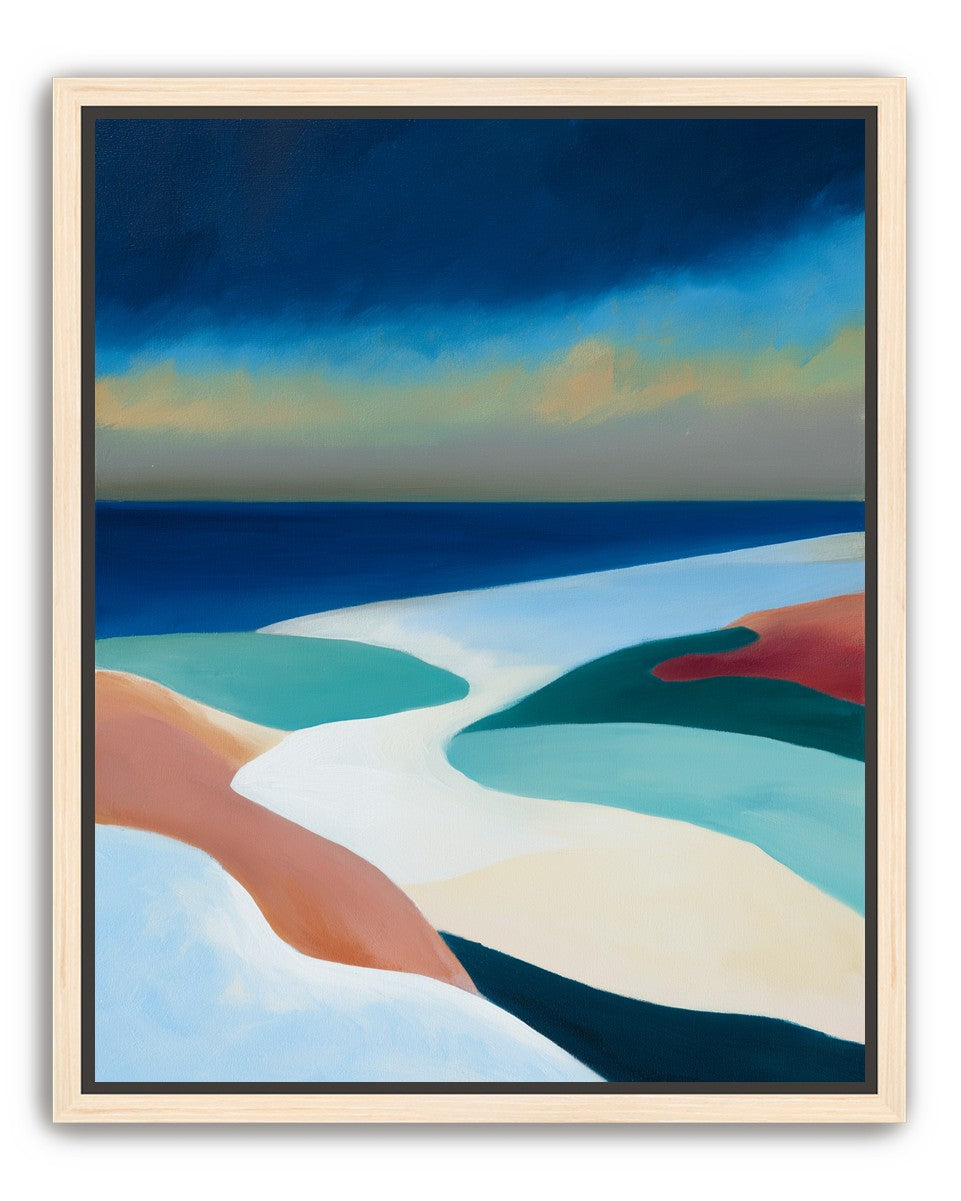 Sandbars under a heavy blue sky