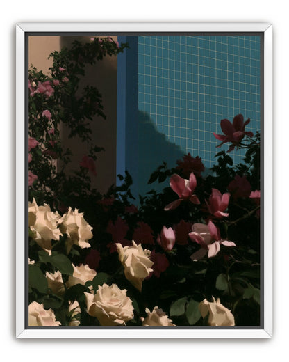 Flowers beneath the tiled wall