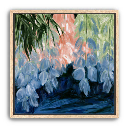 Blue flowers under green leaves