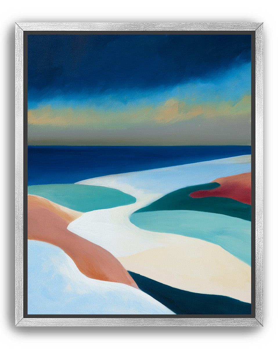 Sandbars under a heavy blue sky