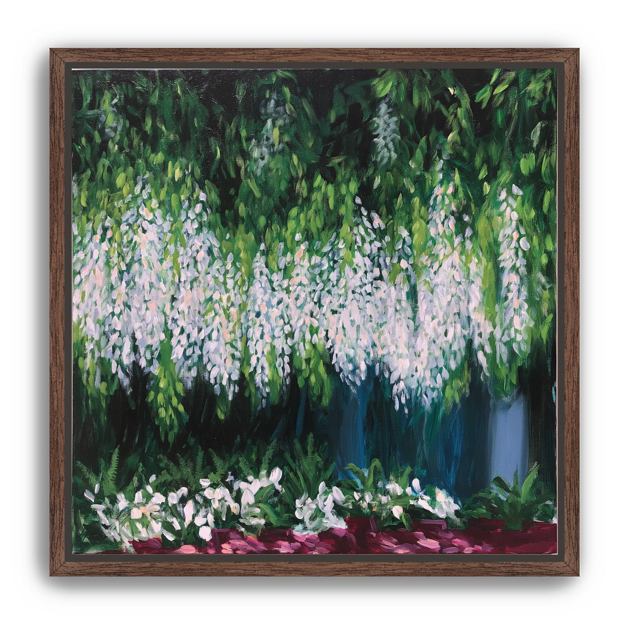 Pale blossoms in green shade