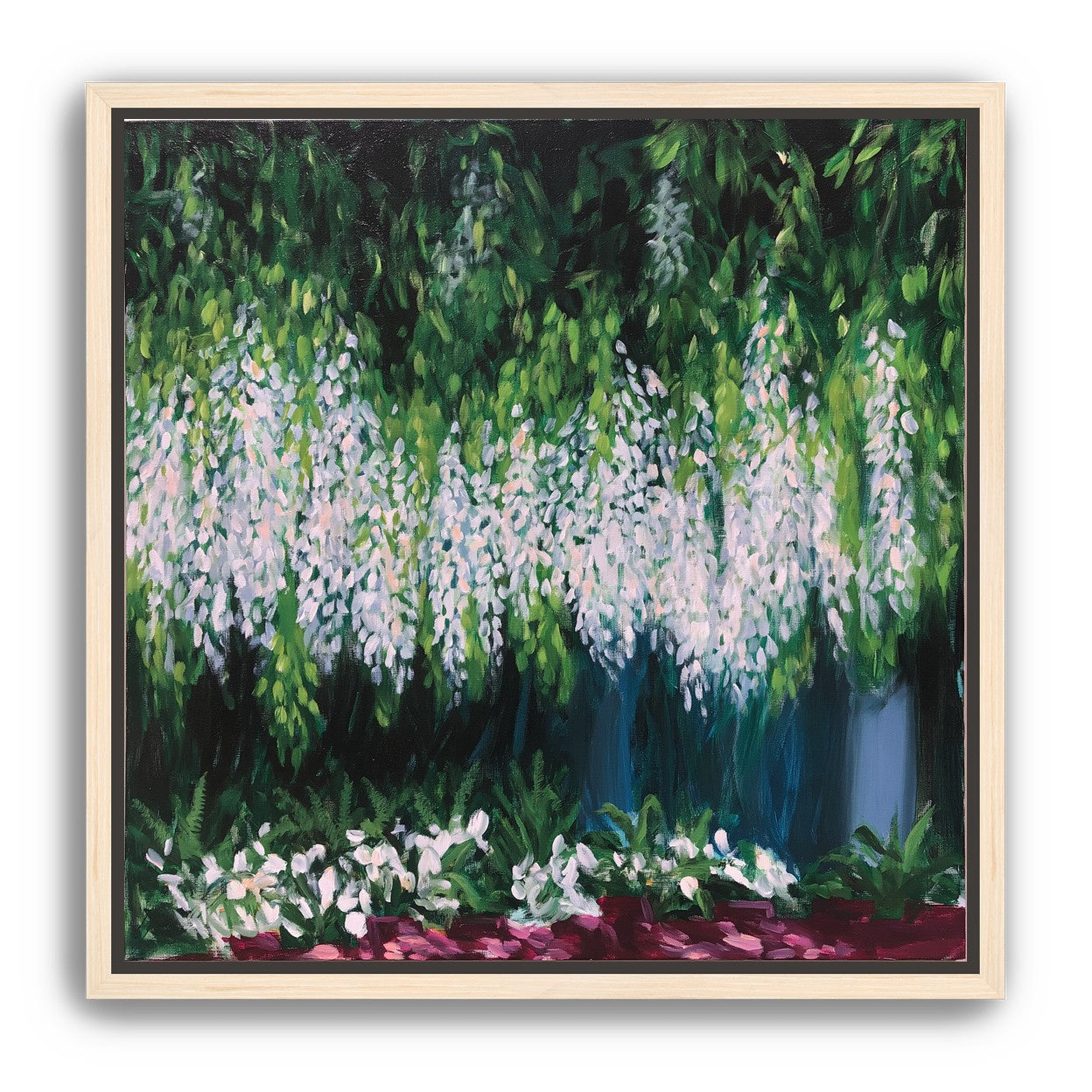 Pale blossoms in green shade