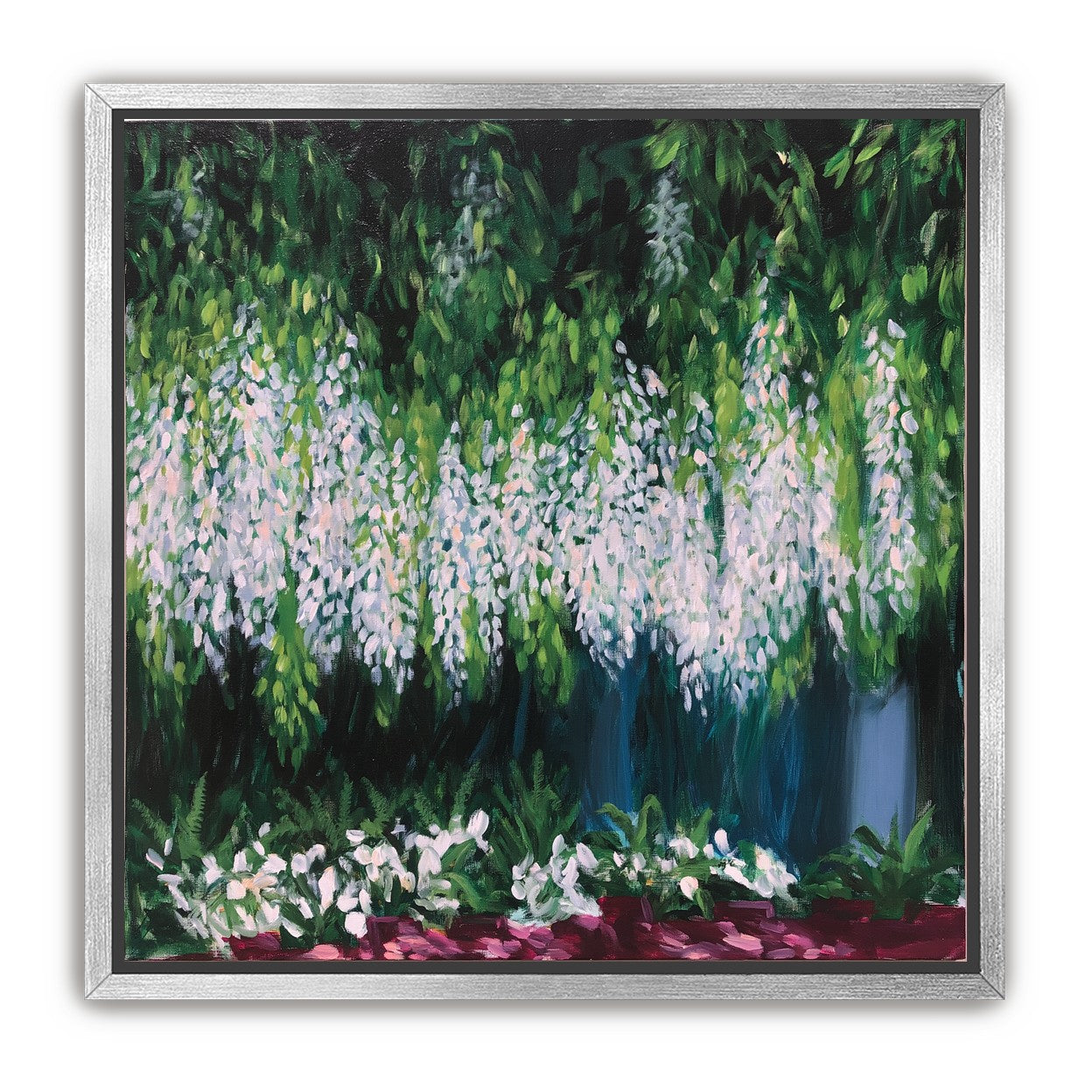 Pale blossoms in green shade