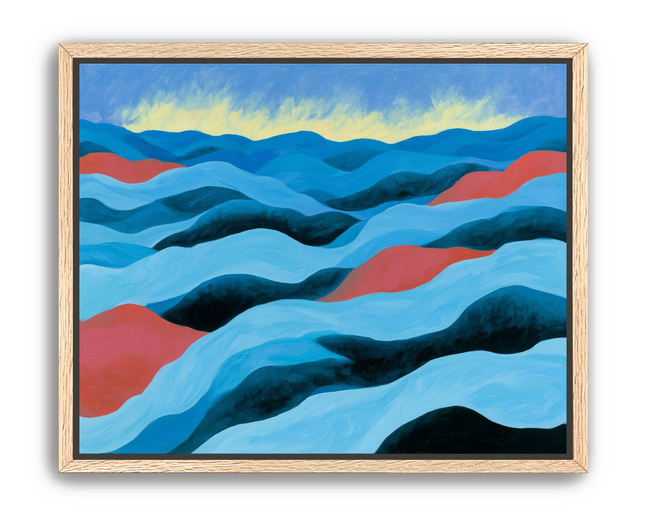 Blue hills under pale sky