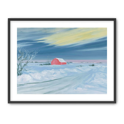 Red barn beneath winter sky