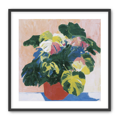 Red pot under heavy leaves